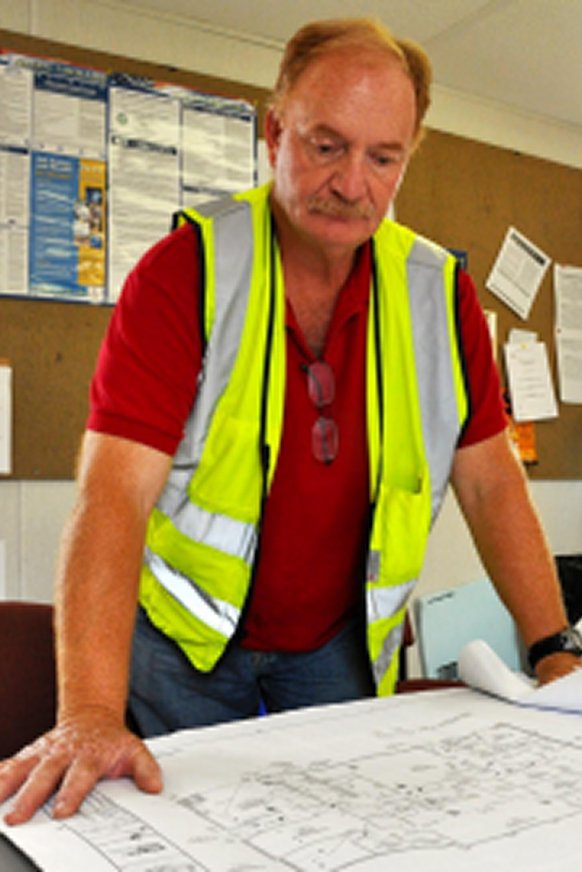 Construction Superintendent looking a blueprint